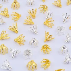 Blomsterpärlhattar Pärlhattar med öglor Mässingsklockpärla> Huvudbonader