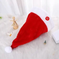 Elektrisk Jultomteluva som Sjunger och Dansar - Batteridriven Röd Plyschluva med Svingande Tomte - Juldekoration och Present><noscript><img width=